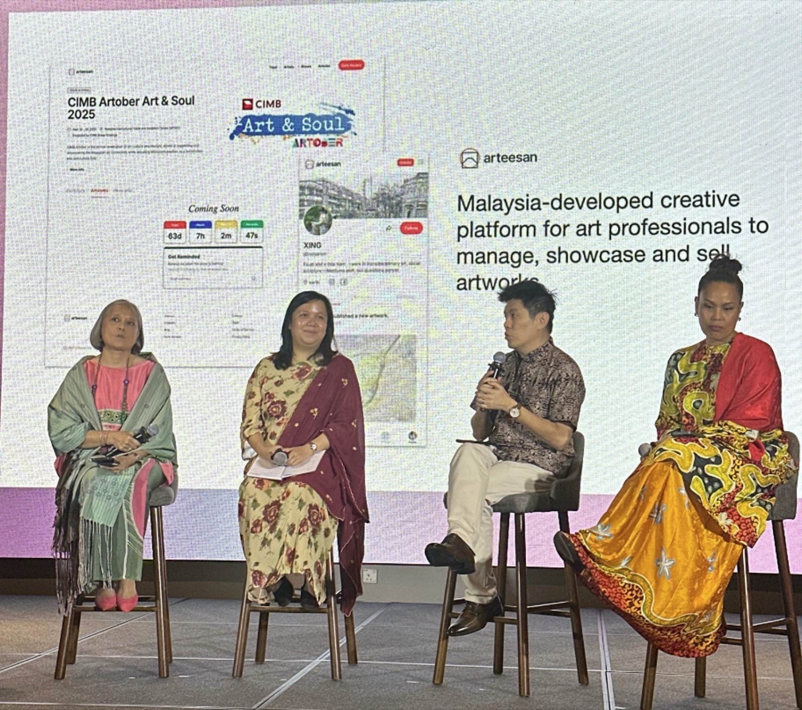Panel discussion at CIMB Artober 2025, with the Arteesan platform shown on the screen behind the speakers